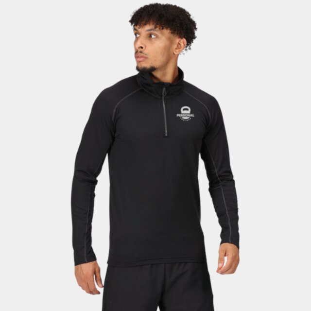 Customisable black performance 1/2 zip technical performance fitness top with Personal Trainer  logo on male model