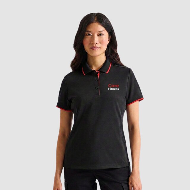 Customisable women's black contrast red performance gym polo with logo on female model