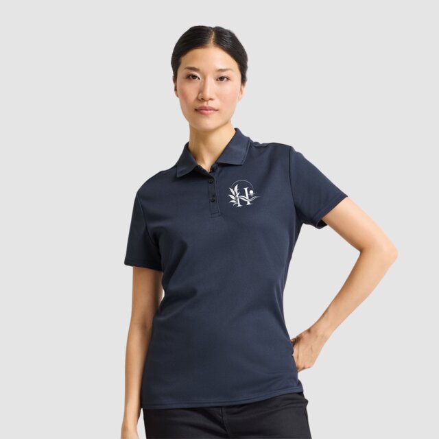 Customisable women's navy performance gym polo with logo on female model