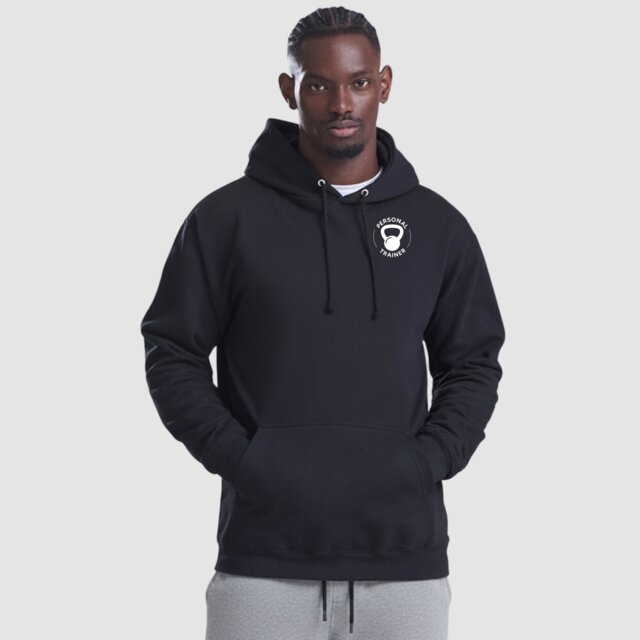 Customisable black gym hoodie with Personal Trainer logo on male model