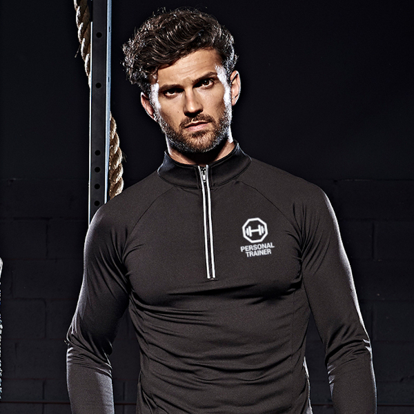 Male fitness professional wearing fitted black personal trainer sweatshirt